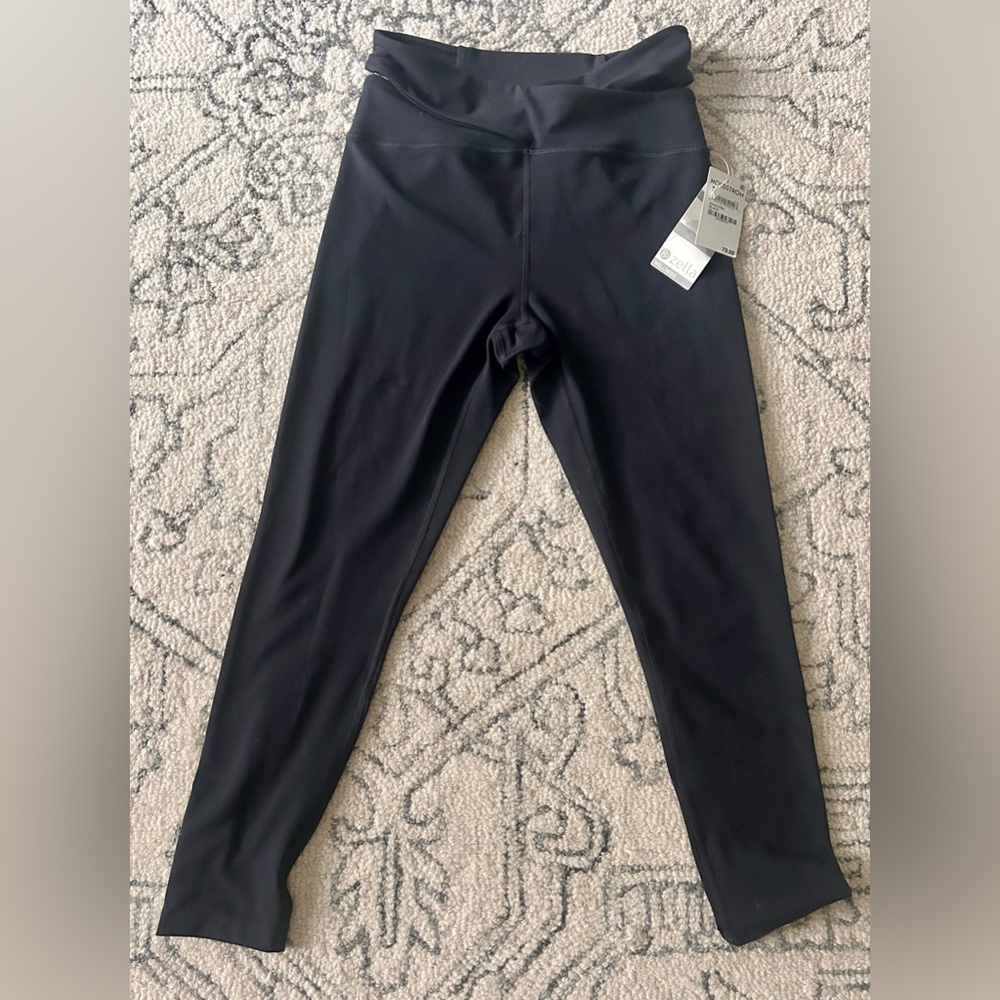 Zella women’s Black Leggings with cut out waistband, new with tags, Size M